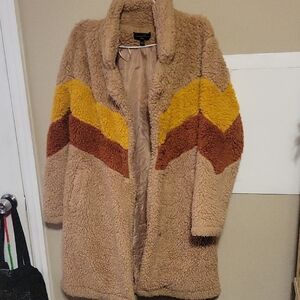 Cozy Tan Sherpa Coat with Chevron Design